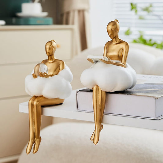 Set of 2 Cloud Girl Resin Sculptures – Gold Abstract Art Figurines Sitting on Clouds with Book and Moon